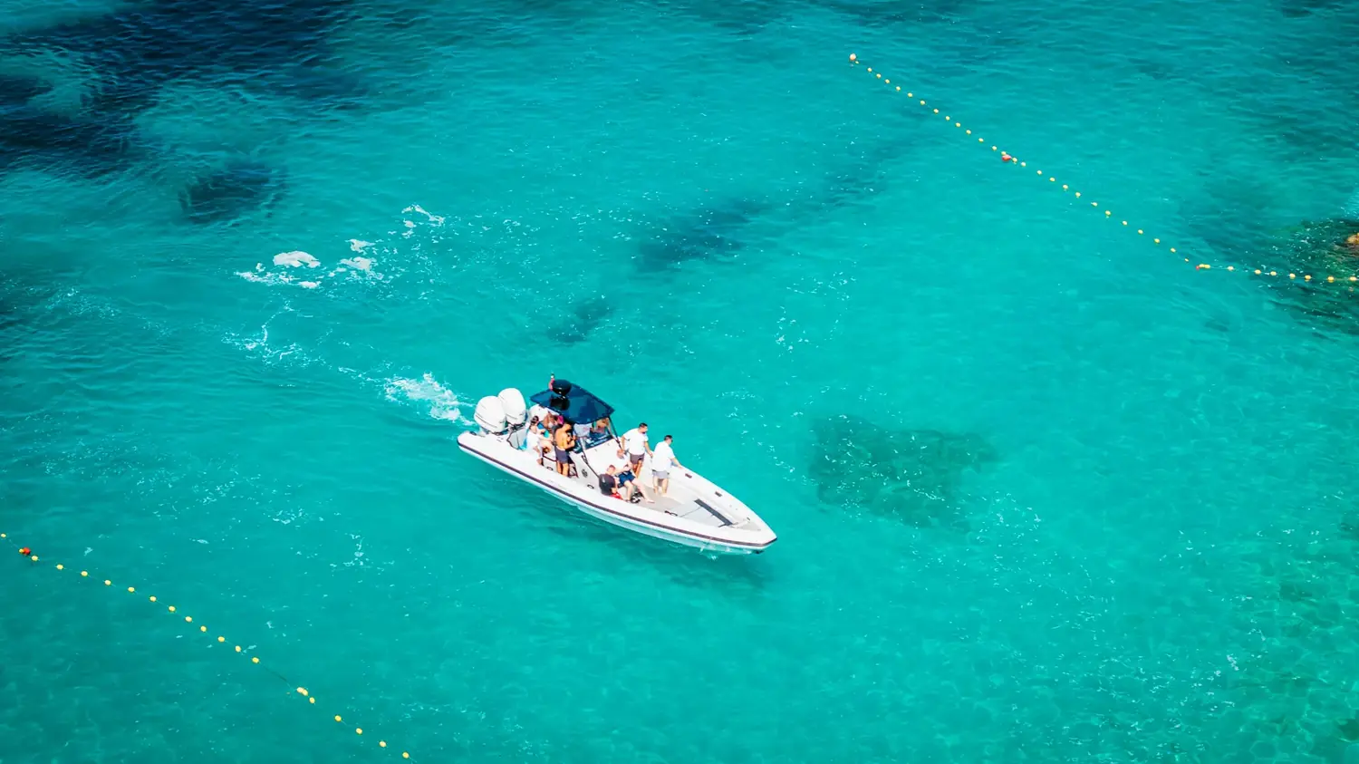 Swim stop at anchor — stop on the Hidden Coves Group boat tour from Saranda