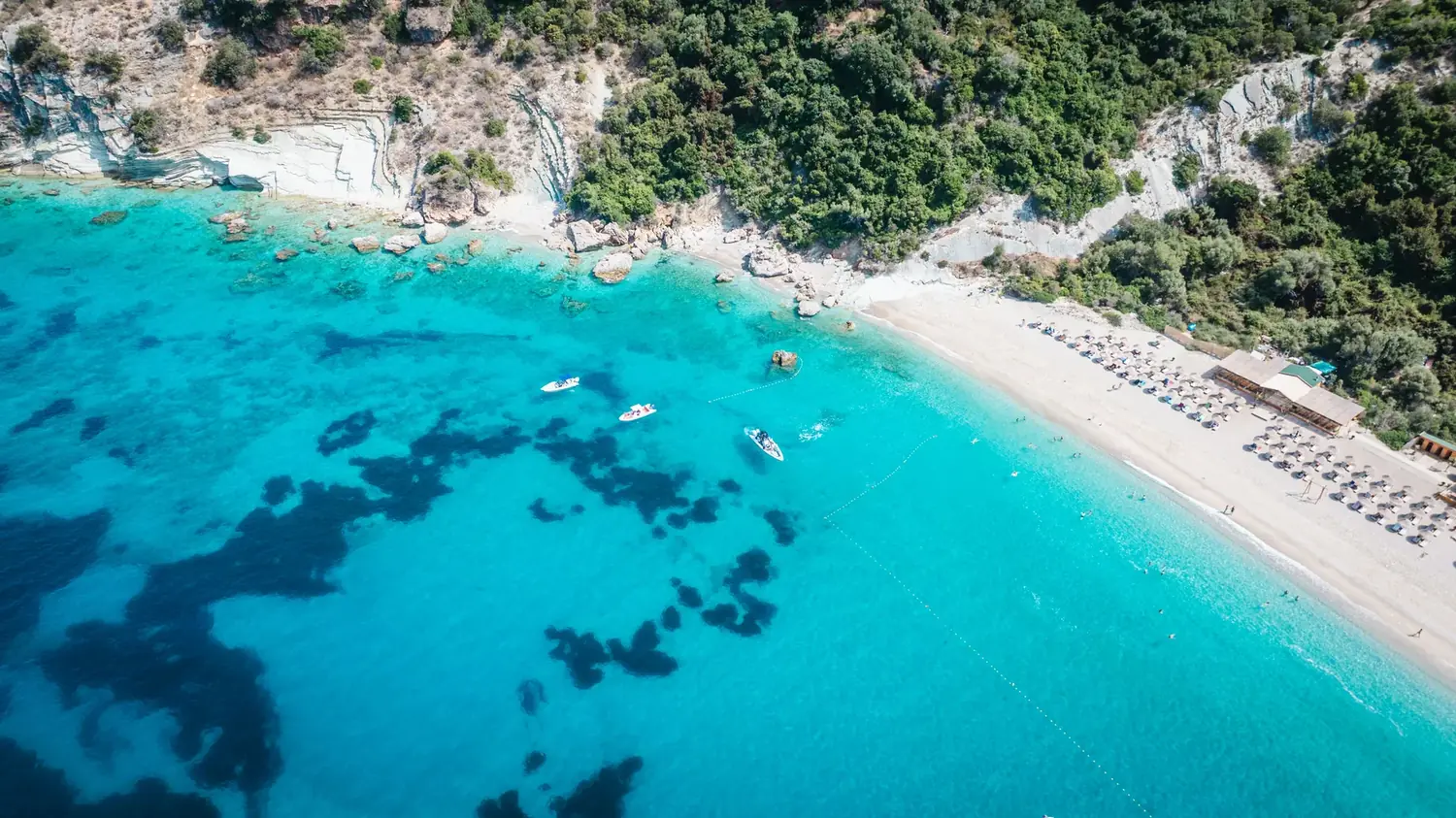 Turquoise swim bay — stop on the Hidden Coves Group boat tour from Saranda